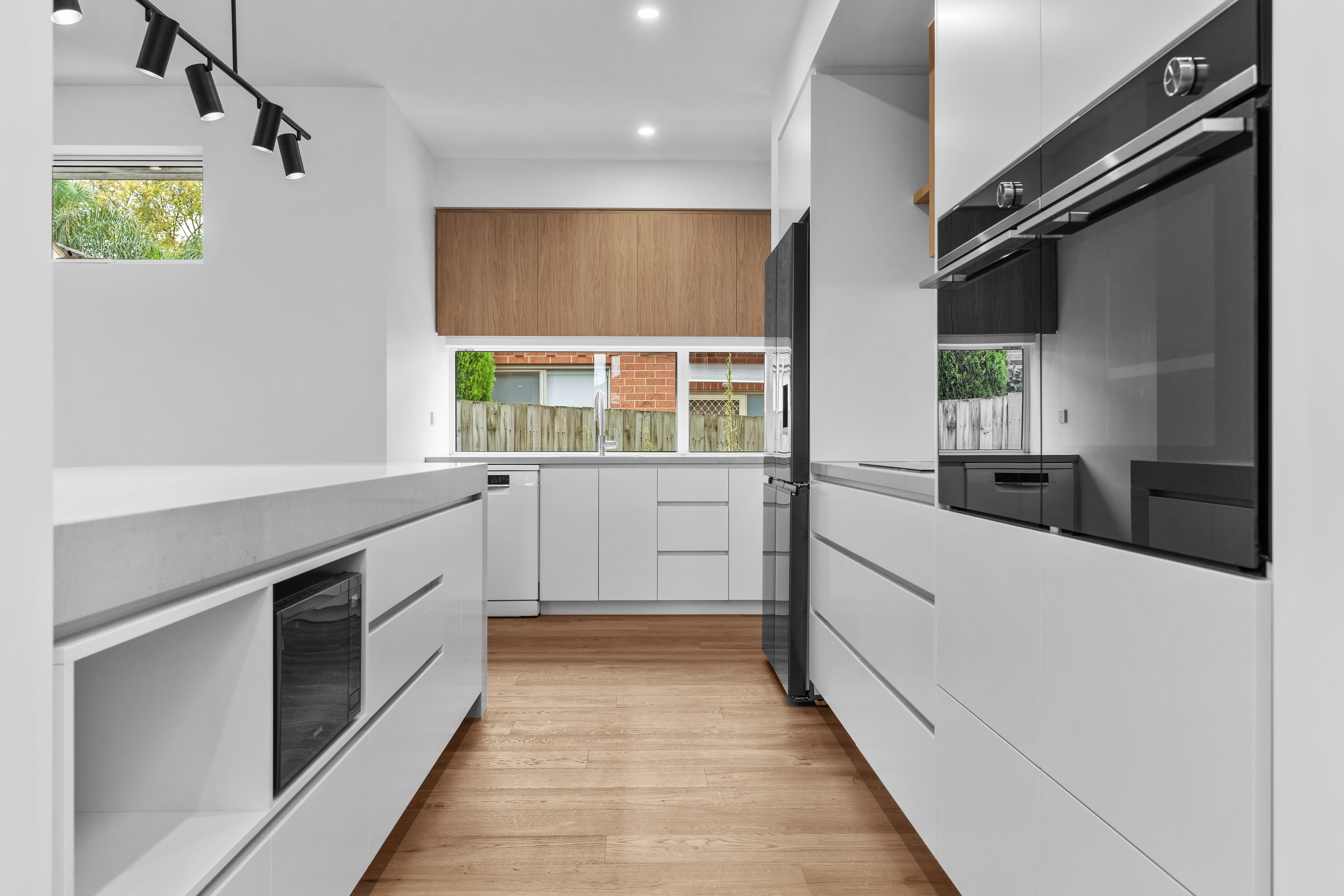 Modern kitchen with white joinery panels