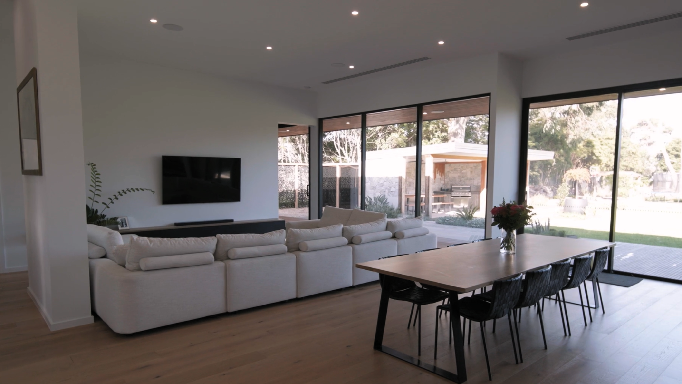 Modern living area with tall sliding doors