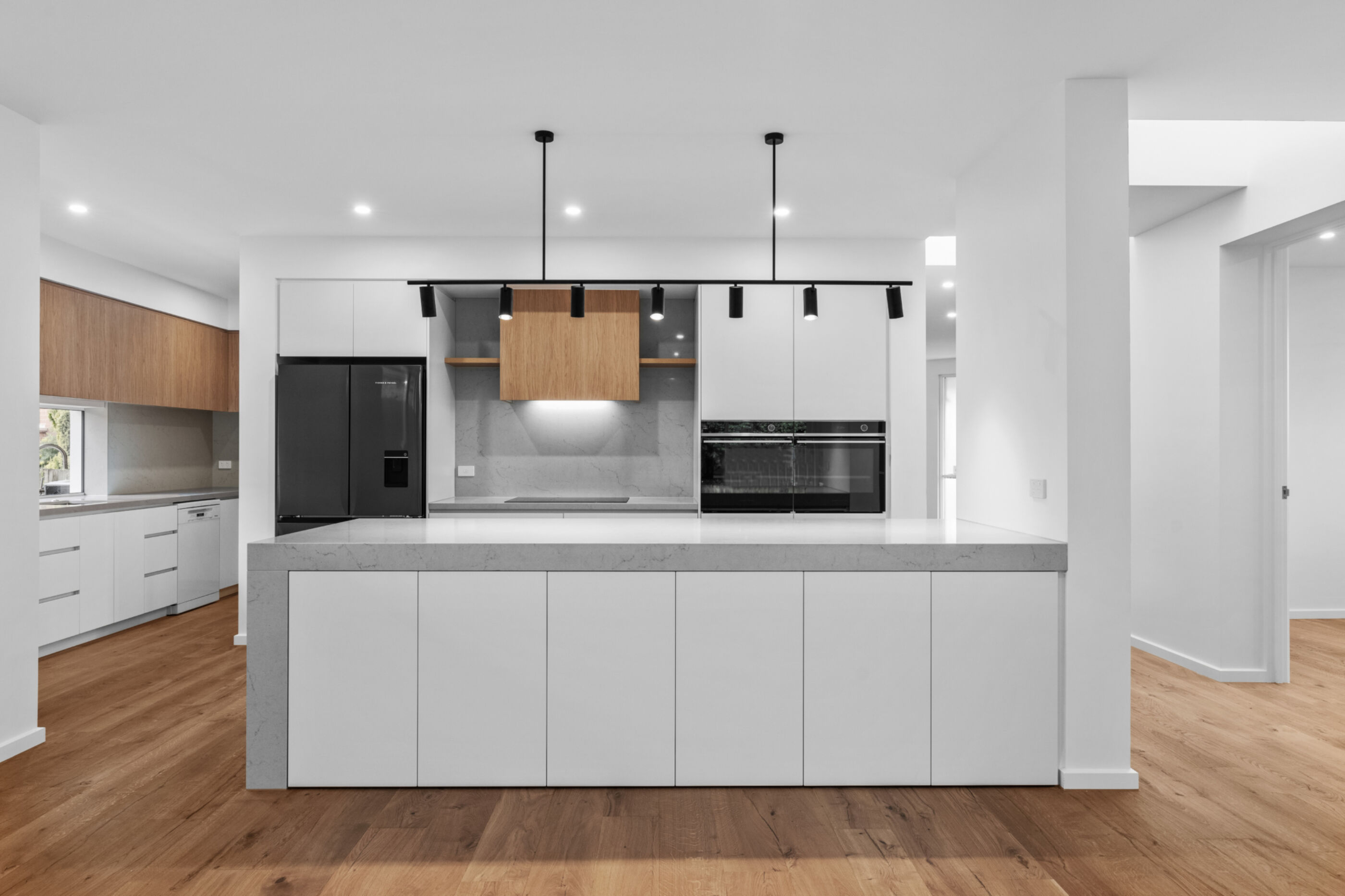 Modern kitchen with stone bench