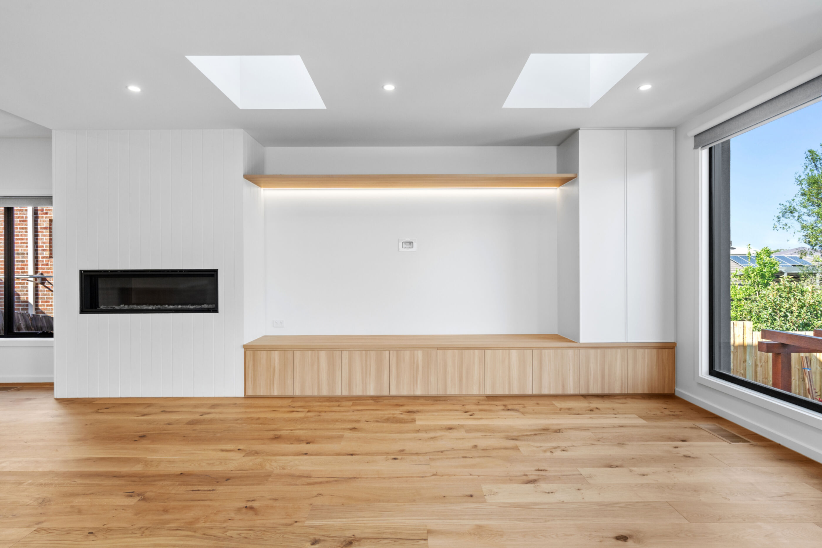 Living room joinery with skylights